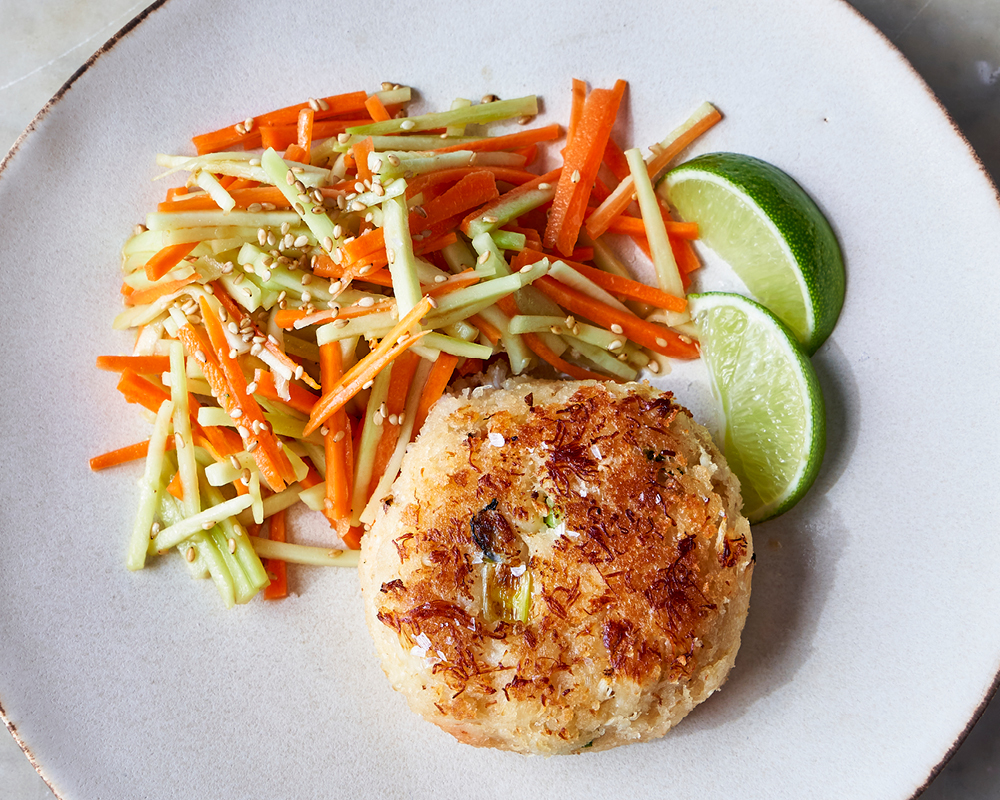 Plate of crab cakes with sesame ginger slaw
