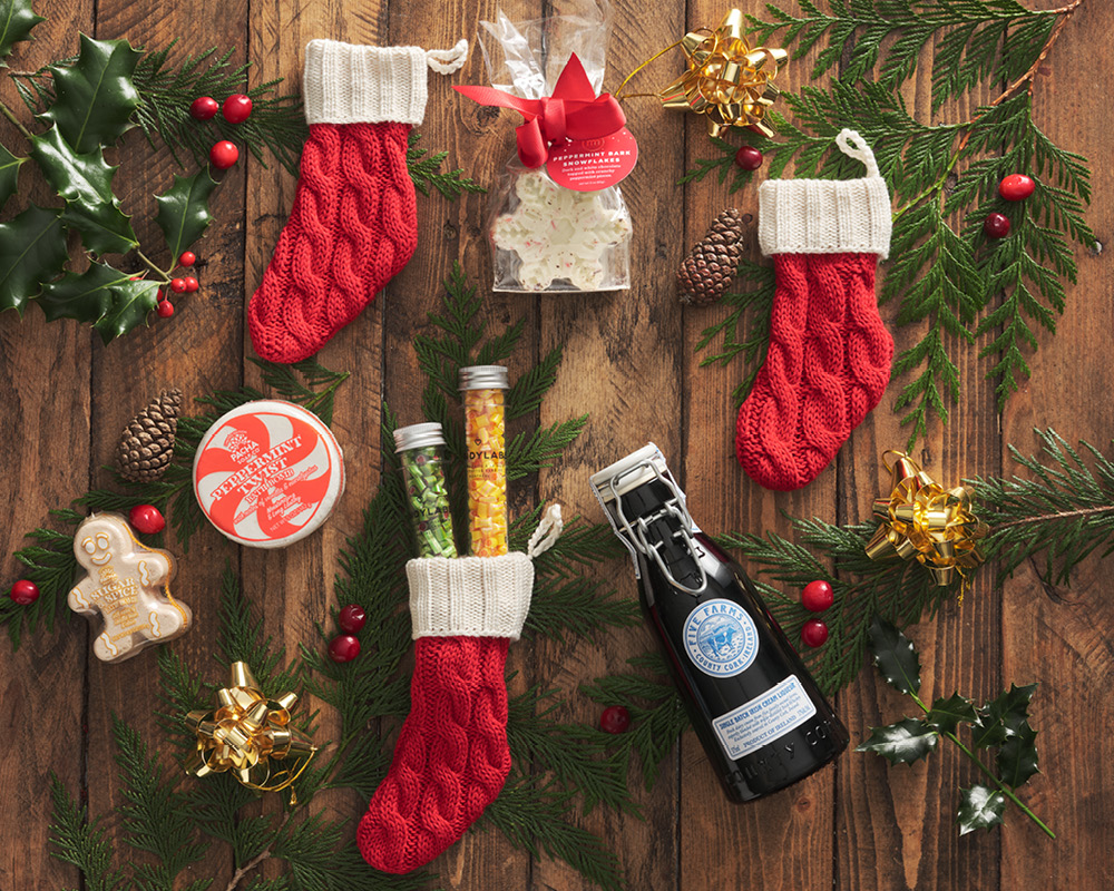 Stocking stuffers filled with holiday candy and gifts