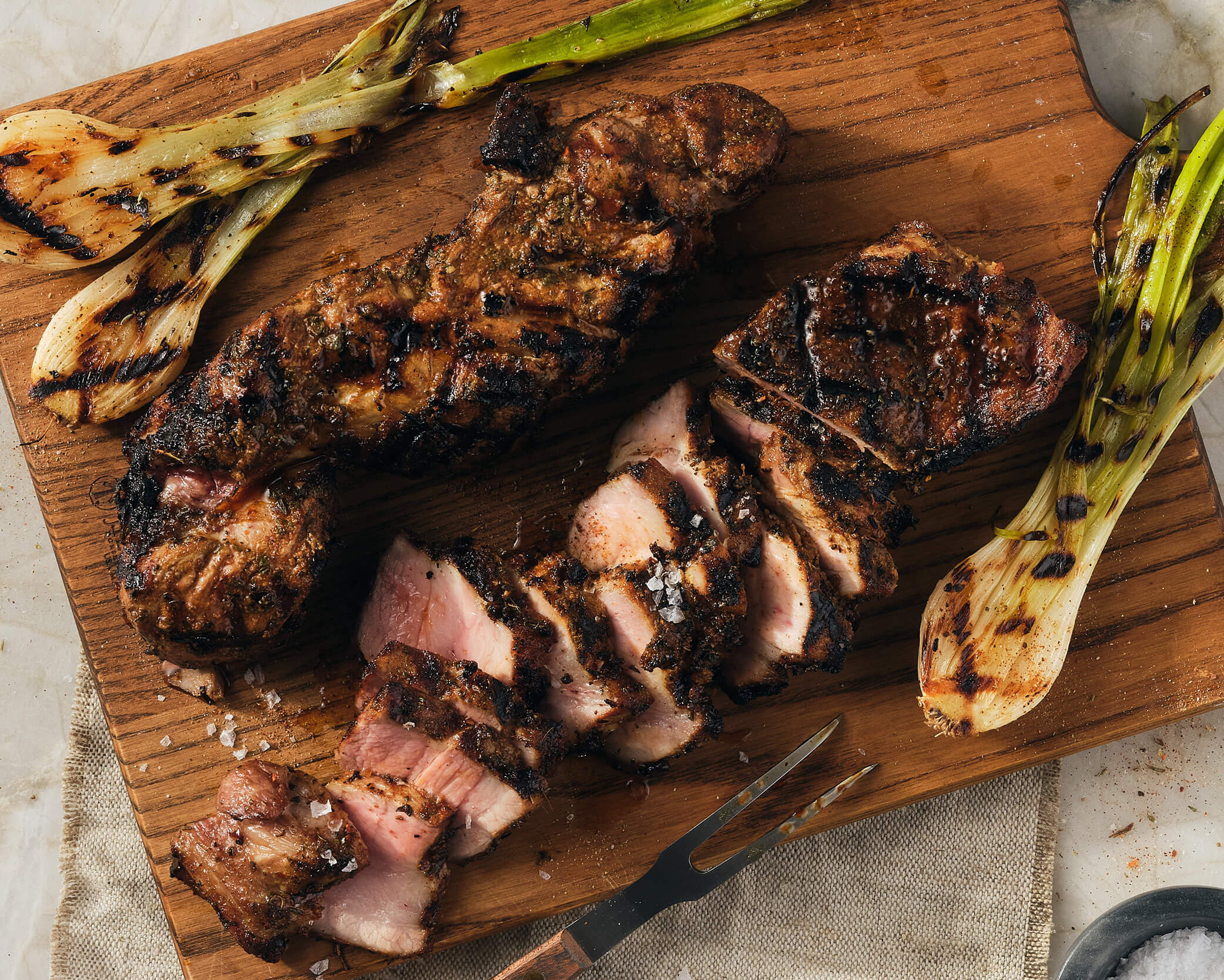 meat and vegetables on a grill