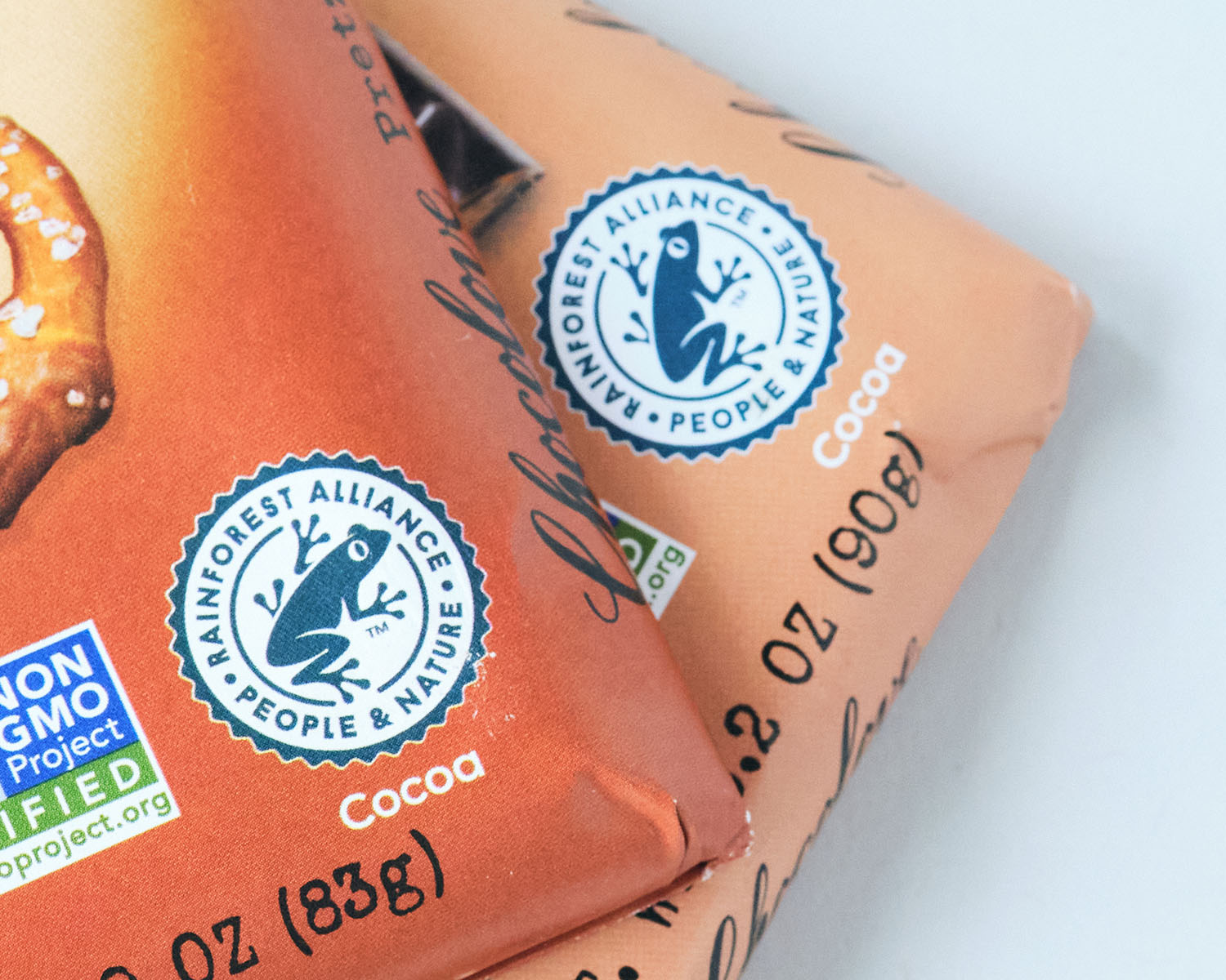 Close up image showing Rainforest Alliance logo on food packages.