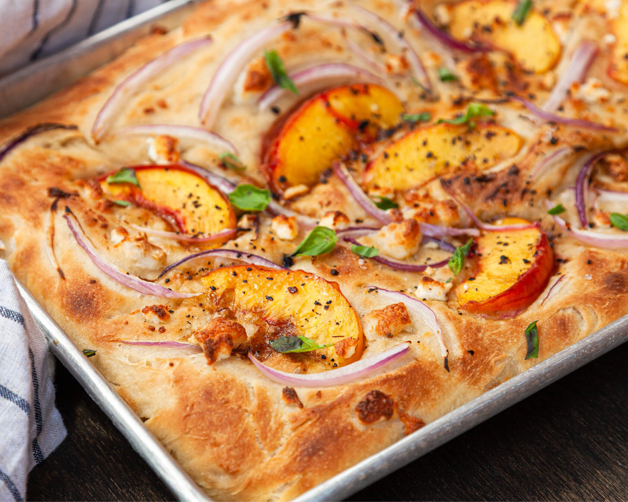 peaches and onions on foccacia