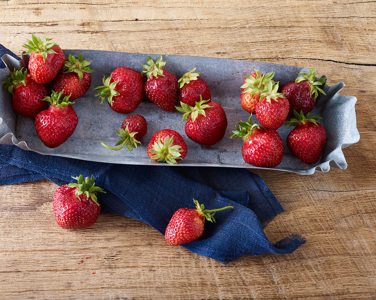 Strawberries in a metal cake pan