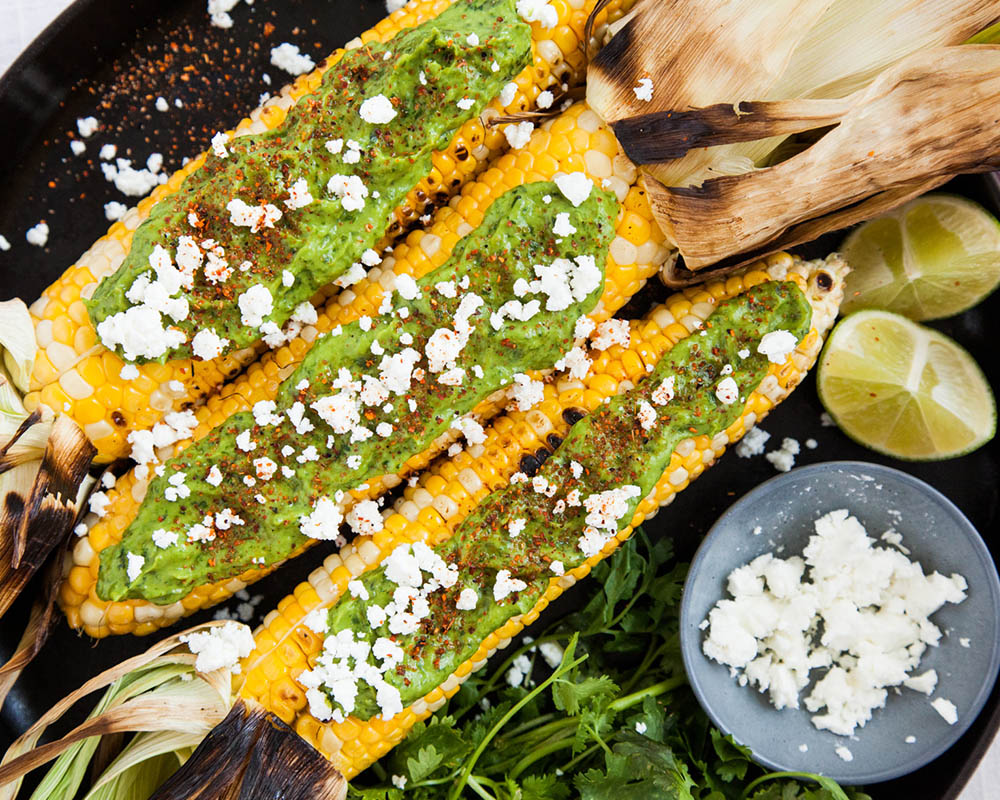 grilled corn with avocado and cotija cheese