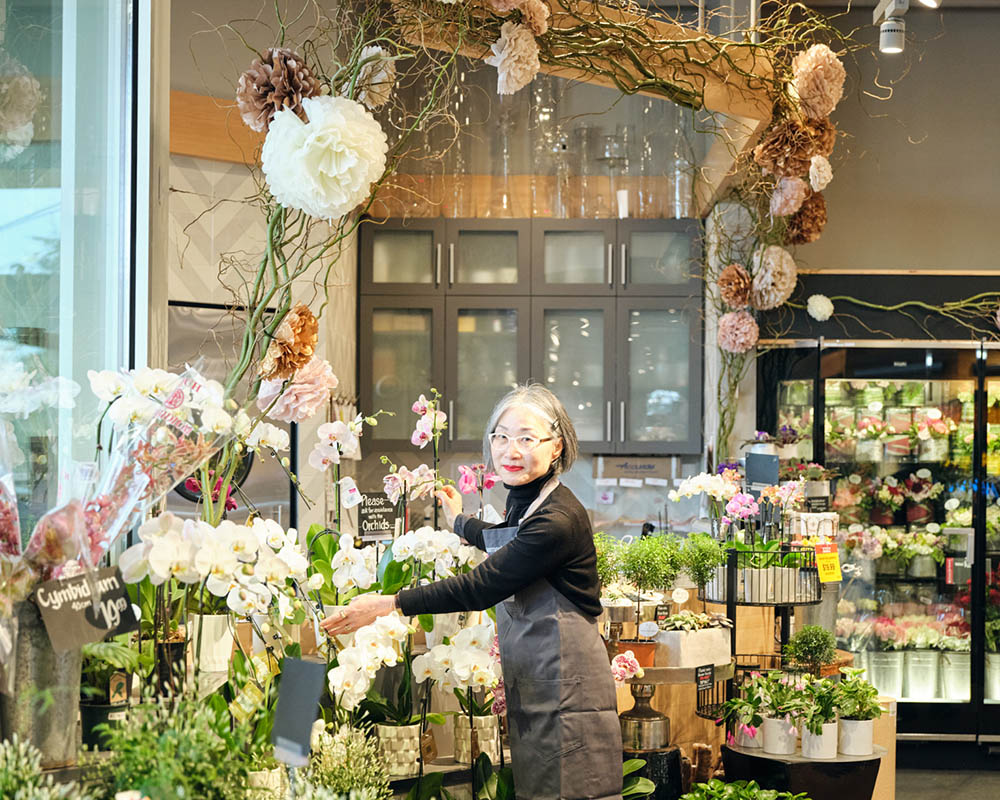 Yumi Han in the floral department