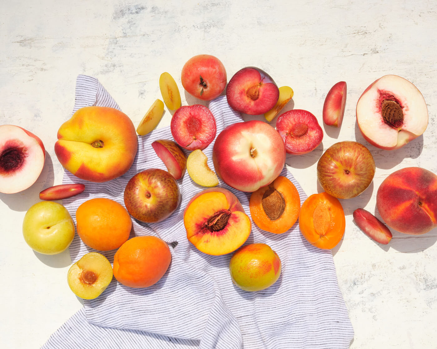 assortment of stone fruit