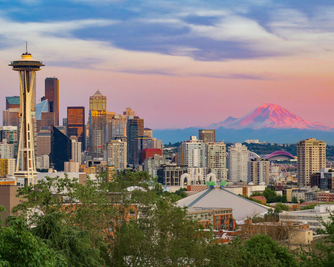 Seattle skyline with the Space Needle on the left and Mount Rainier in the background on the right