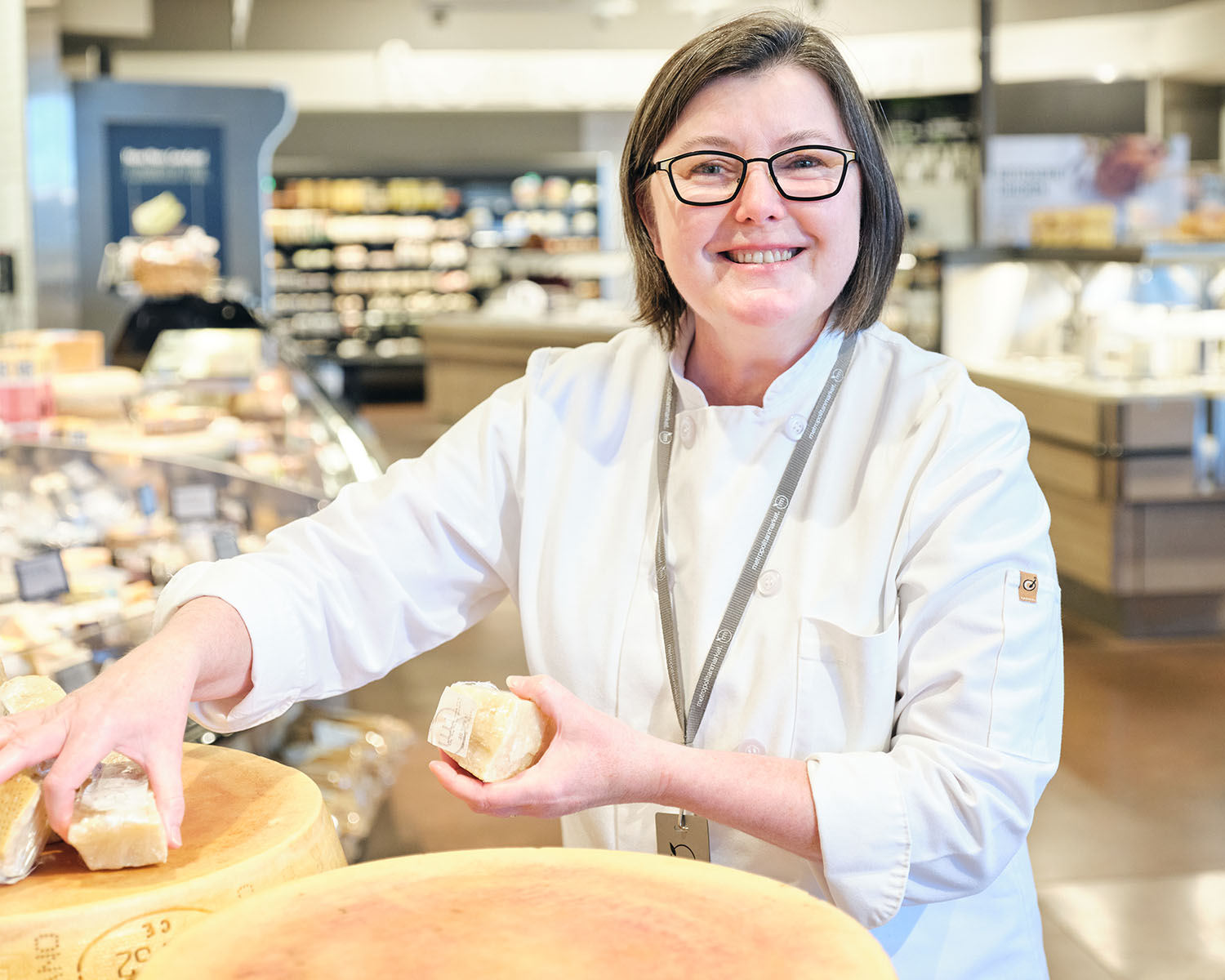 Kim Martin arranging parmesan display