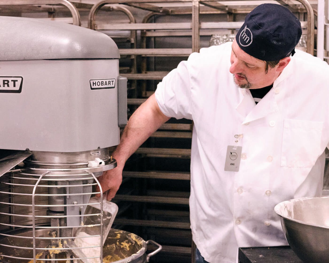 baker mixing batter