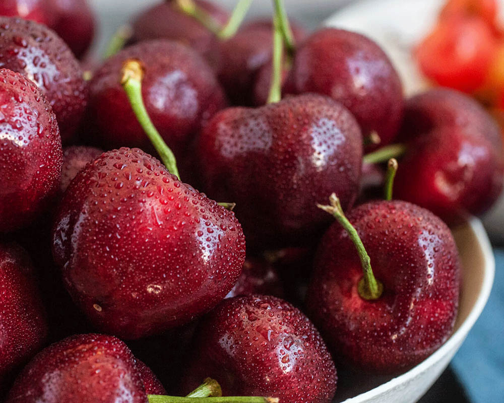 Red cherries in a bowl