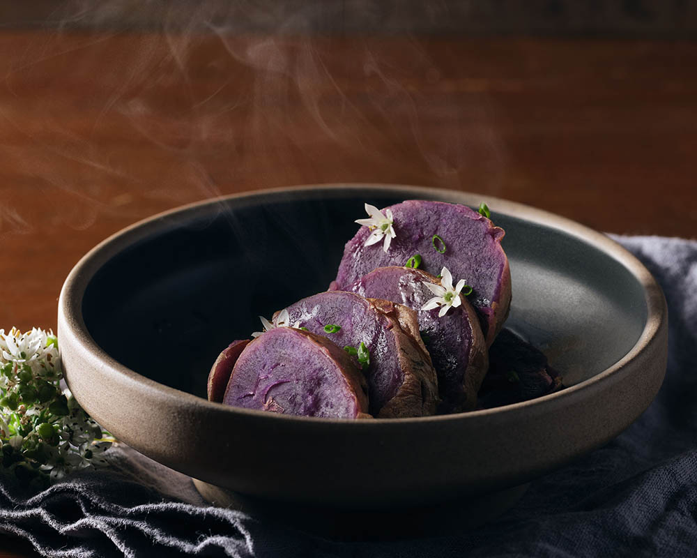 Sliced purple potatoes in a bowl