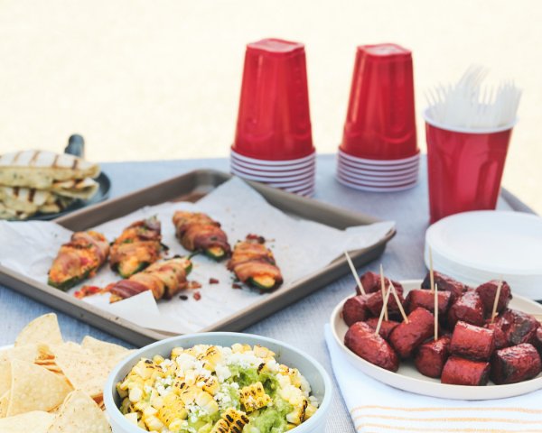 Snacks on a table with red solo cups