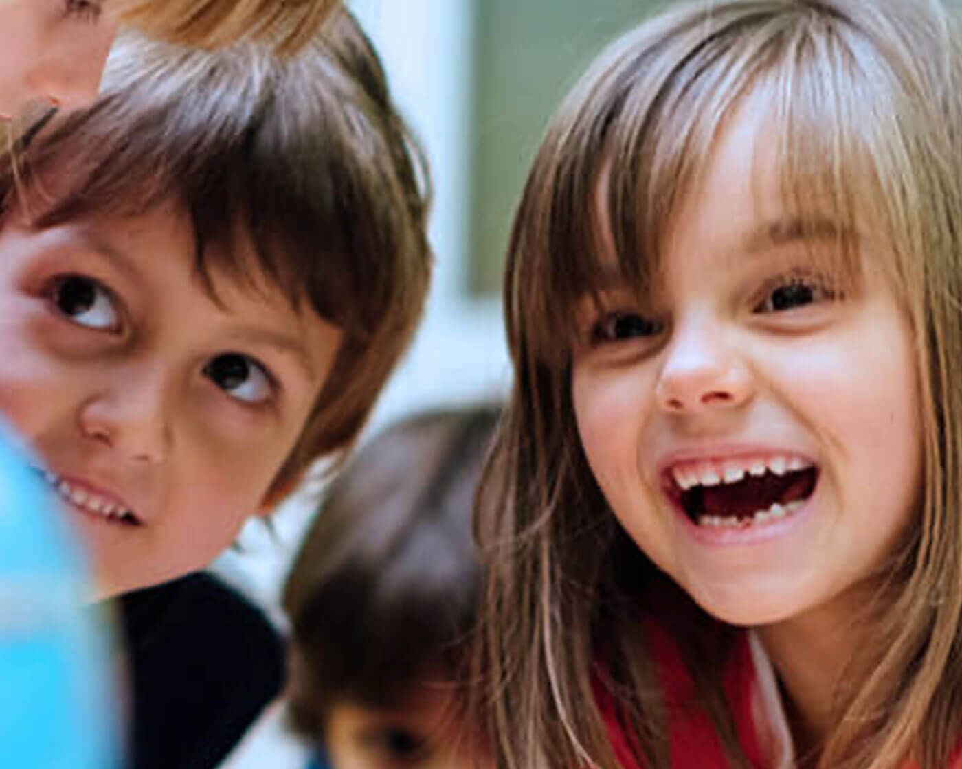 Two children smiling