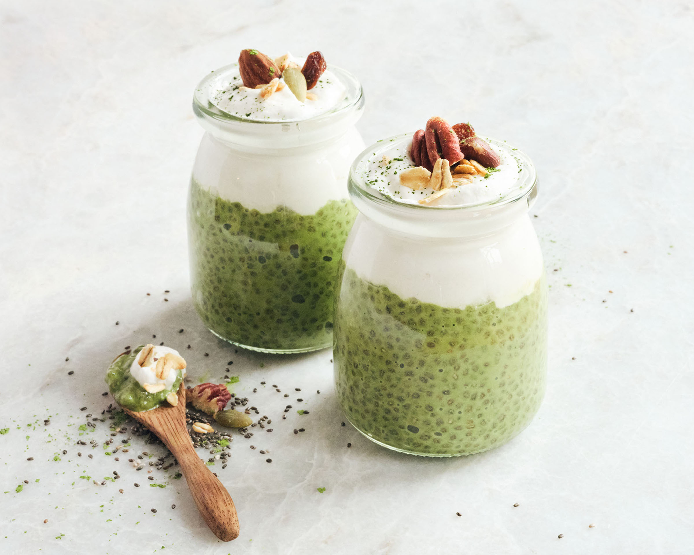 Two small jars with chia seed pudding.