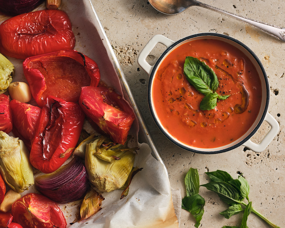 Tomato, bell pepper, and artichoke soup with veggies roasted on sheet pan