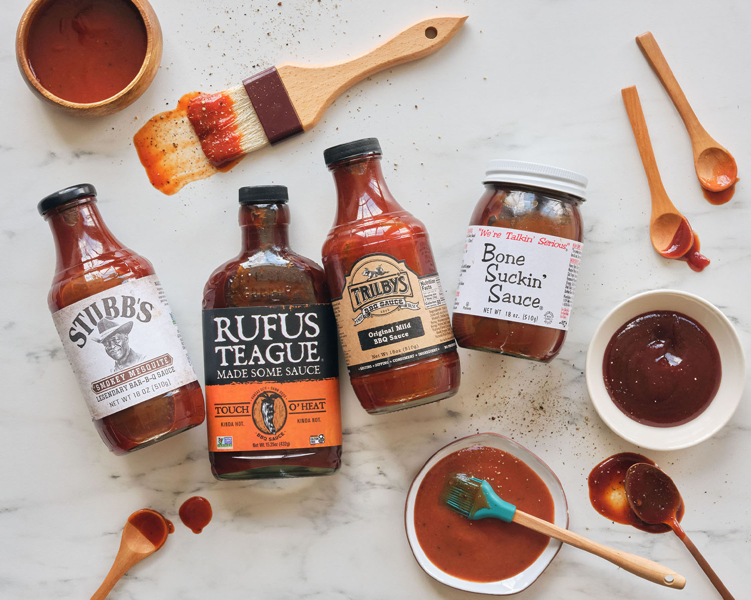 BBQ sauces on a white countertop.