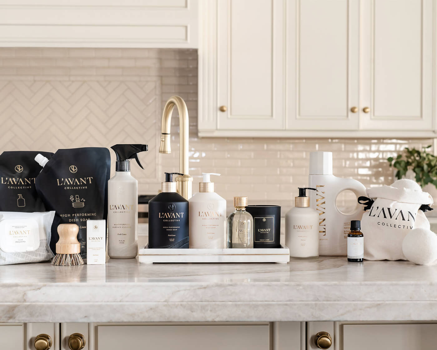 L'AVANT products on a counter in a white kitchen.