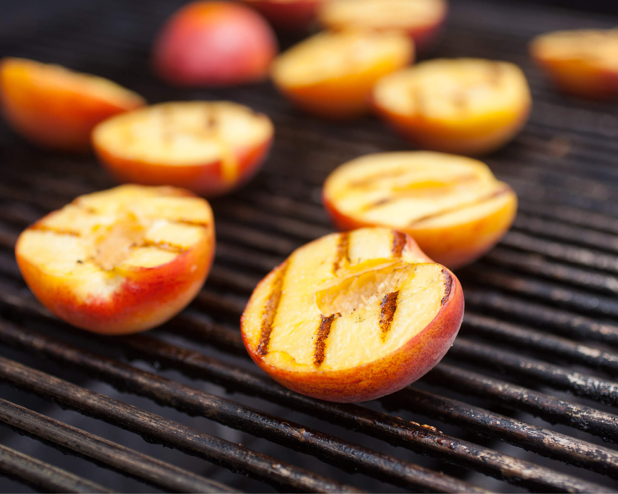 grilled peaches on grill