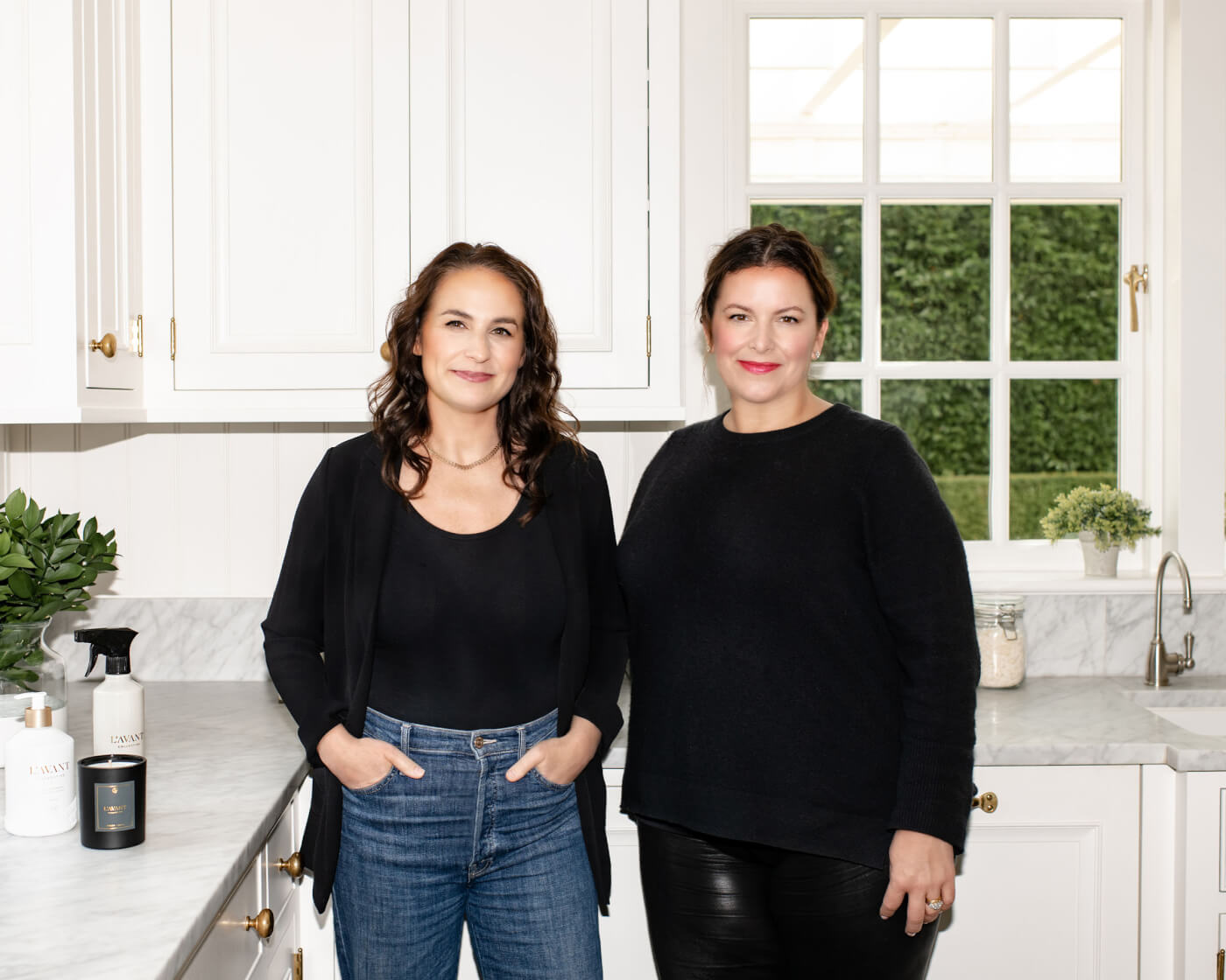 Kristi Lord and Lindsay Droz standing in a kitchen