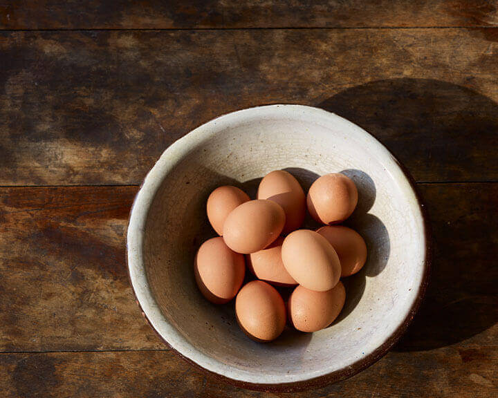 A bowl of brown eggs