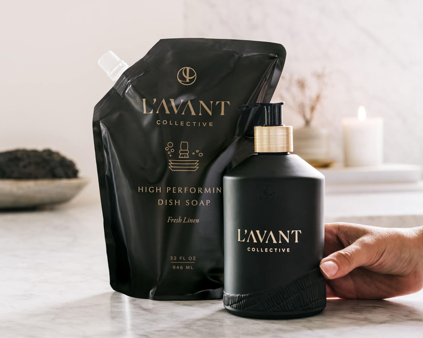 Bottle of L'AVANT soap and a refill package.