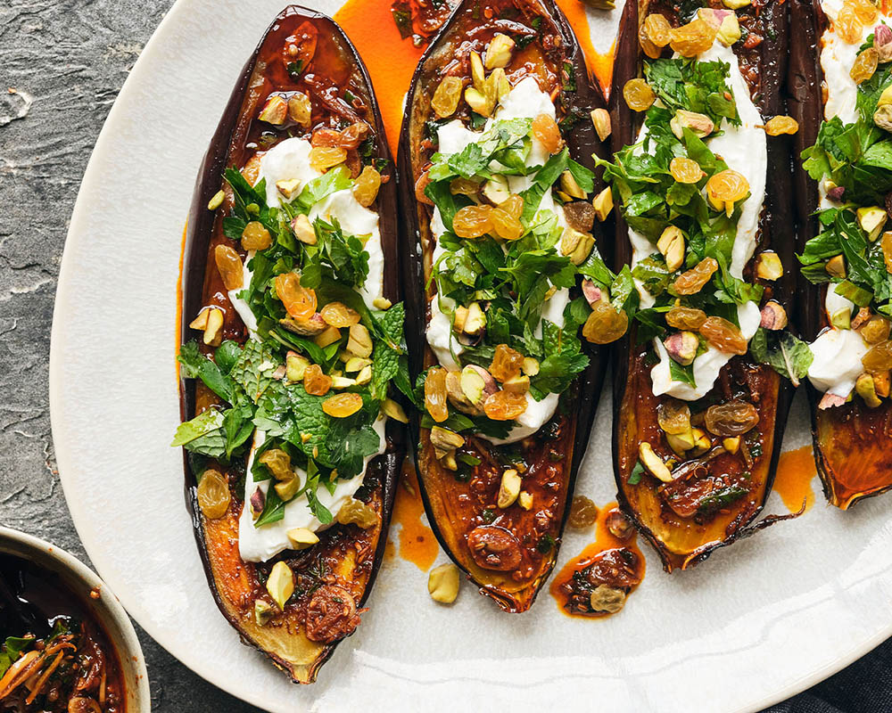 Roasted vegetables covered in a savory sauce.