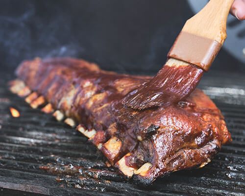 barbecued ribs on the grill