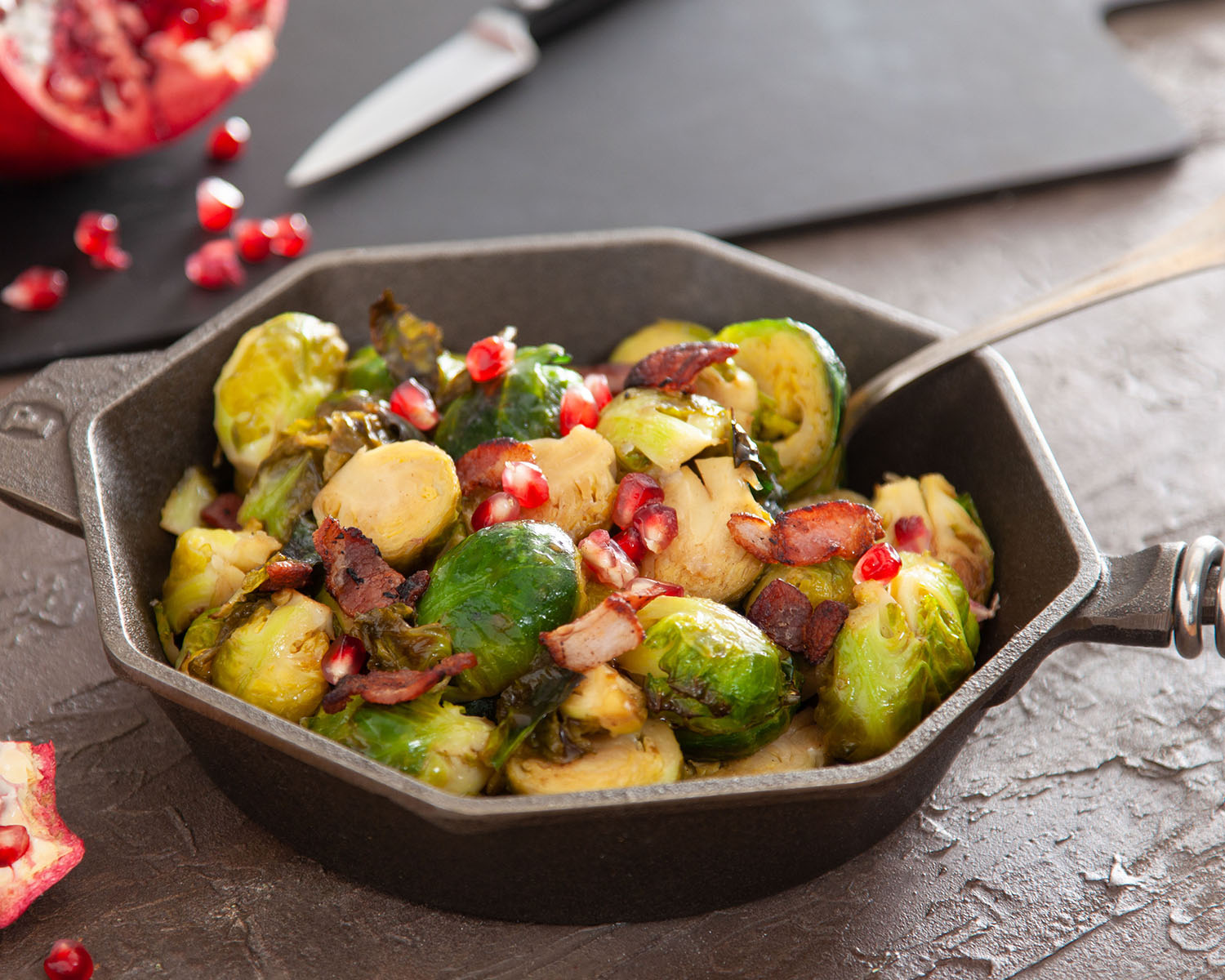 Traditional Holiday Sides Recipes: Roasted Brussels Sprouts with Pancetta and Pomegranate from Metropolitan Market