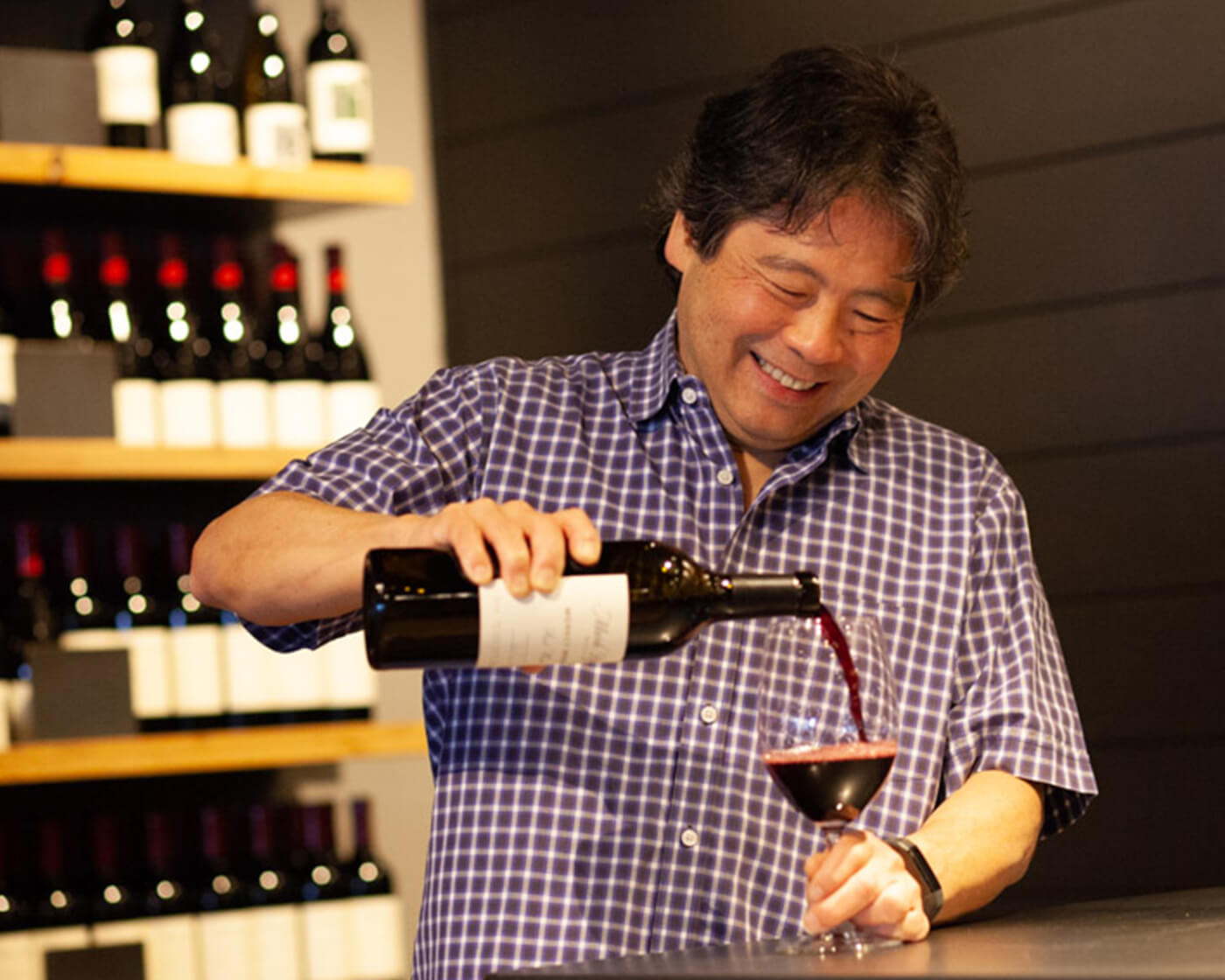 mark takagi pouring wine